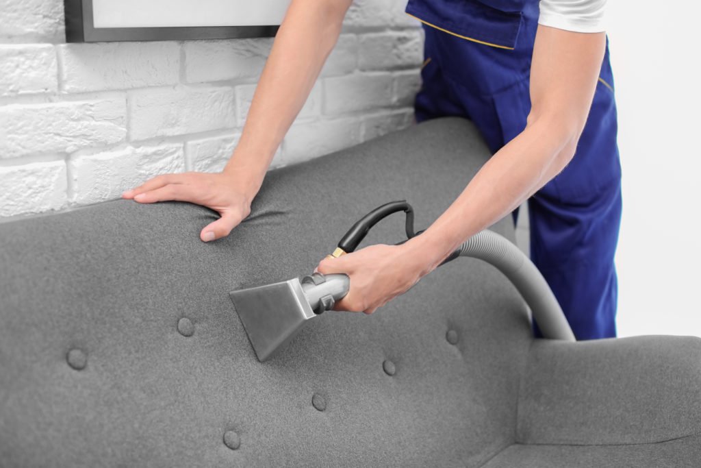 Professional upholstery cleaning on a sofa