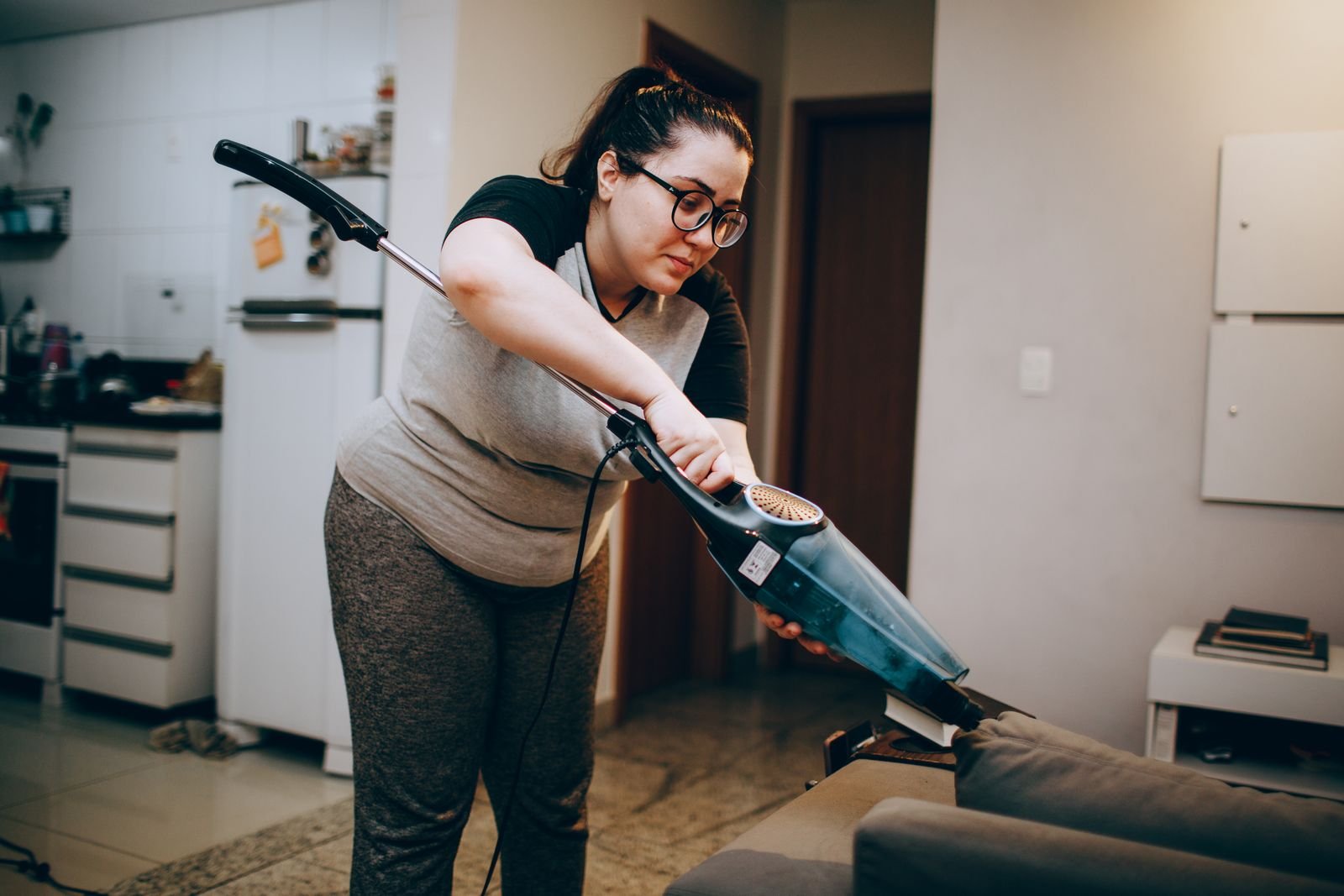 Cleaning sofa cushions with a vacuum
