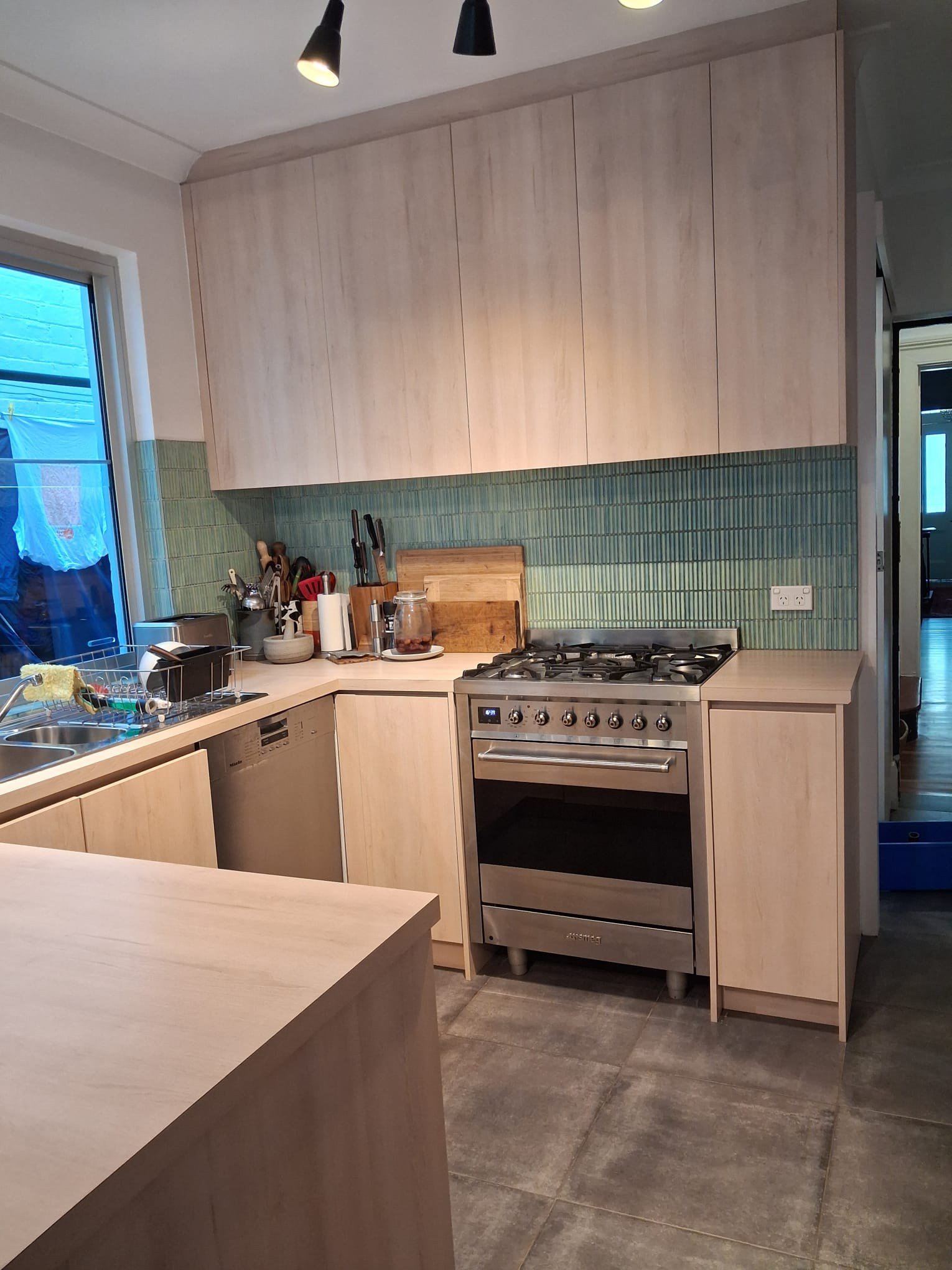 Guru Cleaning Experts preparing a venue kitchen.